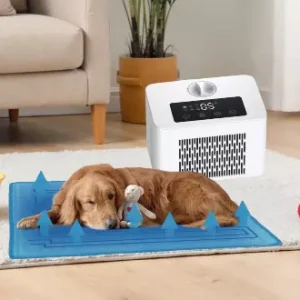 A dog resting comfortably on a pet cooling pad for relief from the heat.